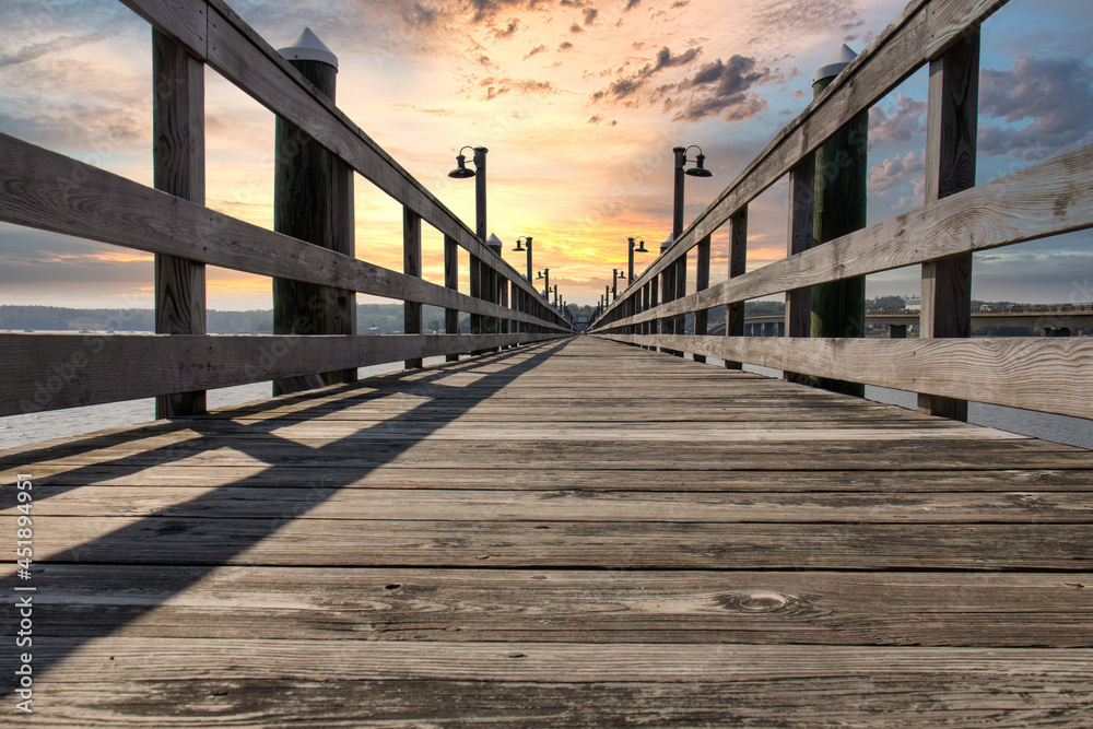 Fototapeta premium wooden pier at sunset