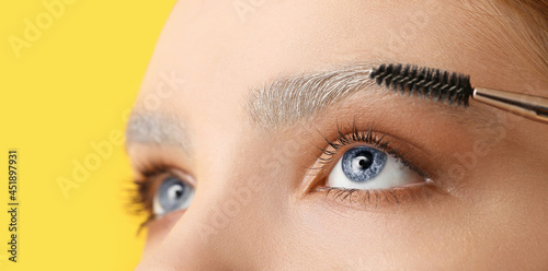 Young woman with dyed eyebr...