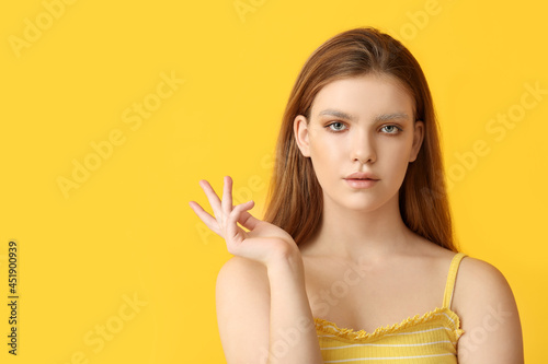 Beautiful young woman with ...