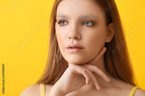 Beautiful young woman with ...