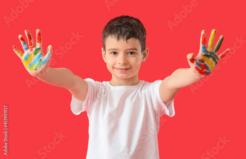Little boy with hands in pa...