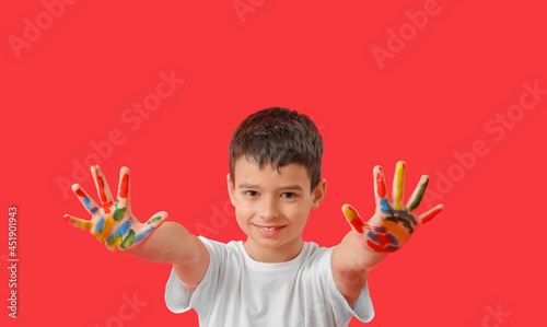 Little boy with hands in pa...