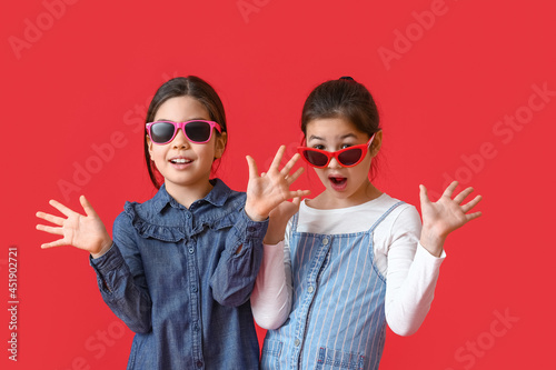 Stylish little sisters on c...