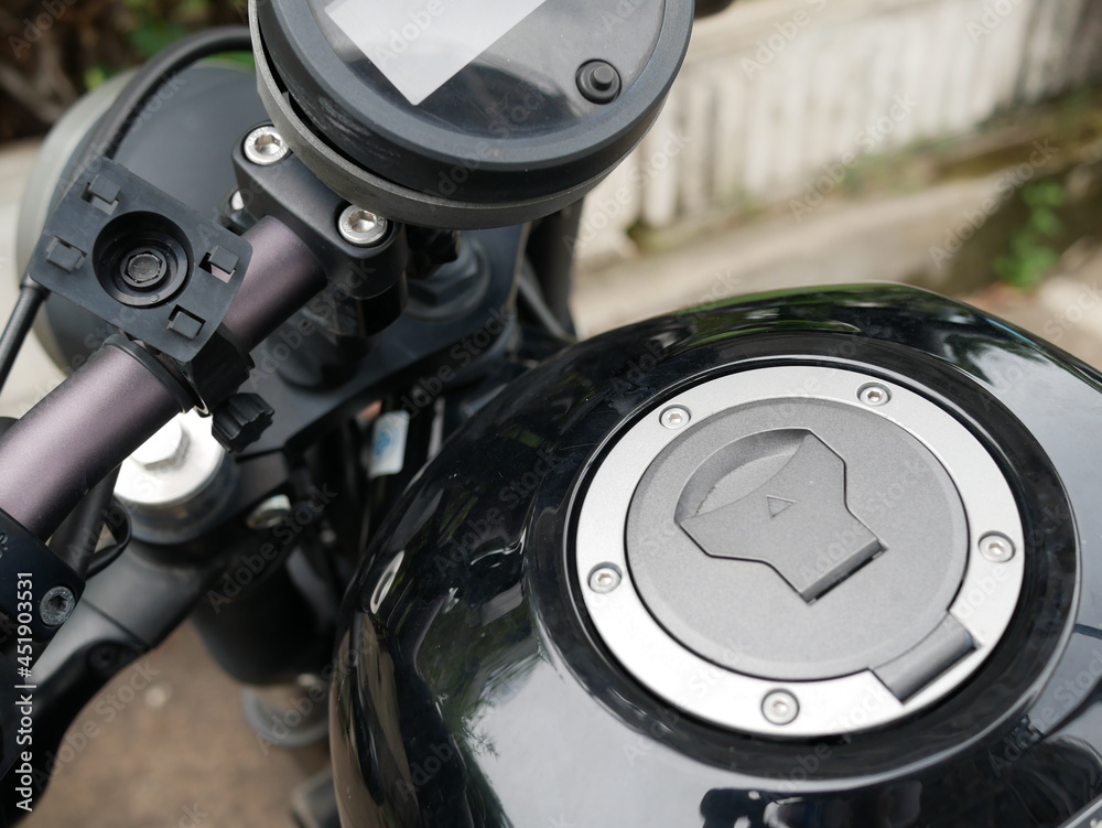 fuel tank cap on a modern motorcycle.