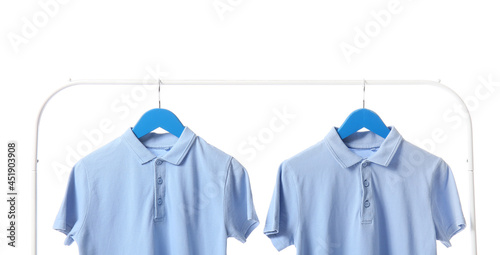 Two light blue polo shirts ...