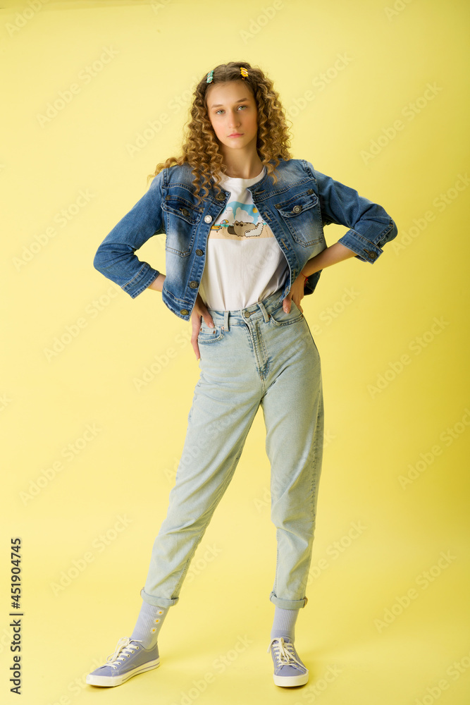 Full length shot of girl with hands on her waist Full length shot of girl with hands on her waist