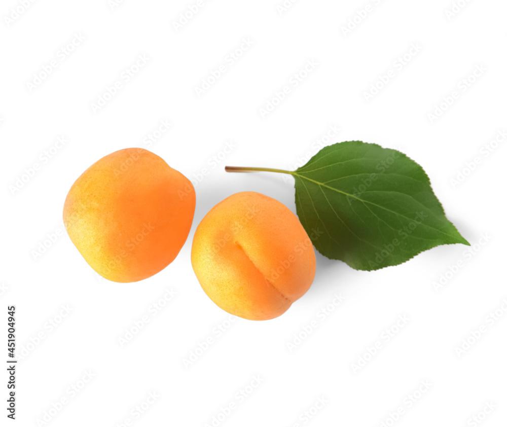 Tasty ripe apricots on white background