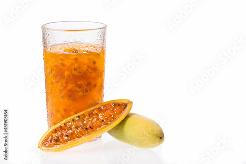 Passiflora tripartita - Tropical curuba juice. Healthy food photo