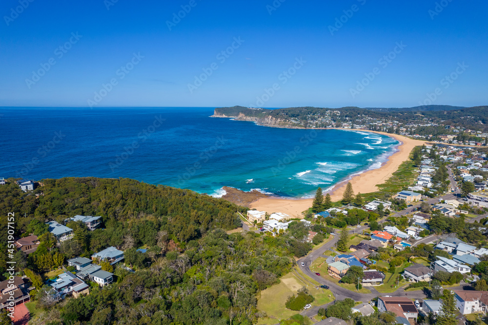Blue ocean with large waves crashing on to North Avoca Shoreline in  New South Wales Australia