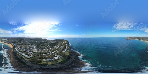 360 degree images of Australian ocean coastline with blue skys and ocean waves below.  NSW Australia 