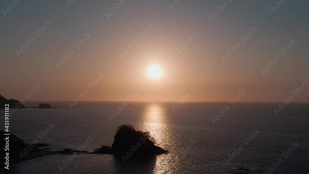 Beautiful Reflections Of Sunset OIn The Ocean From Playa Real On Guanacaste Province, Costa Rica. Beautiful Reflections Of Sunset OIn The Ocean From Playa Real On Guanacaste Province, Costa Rica.