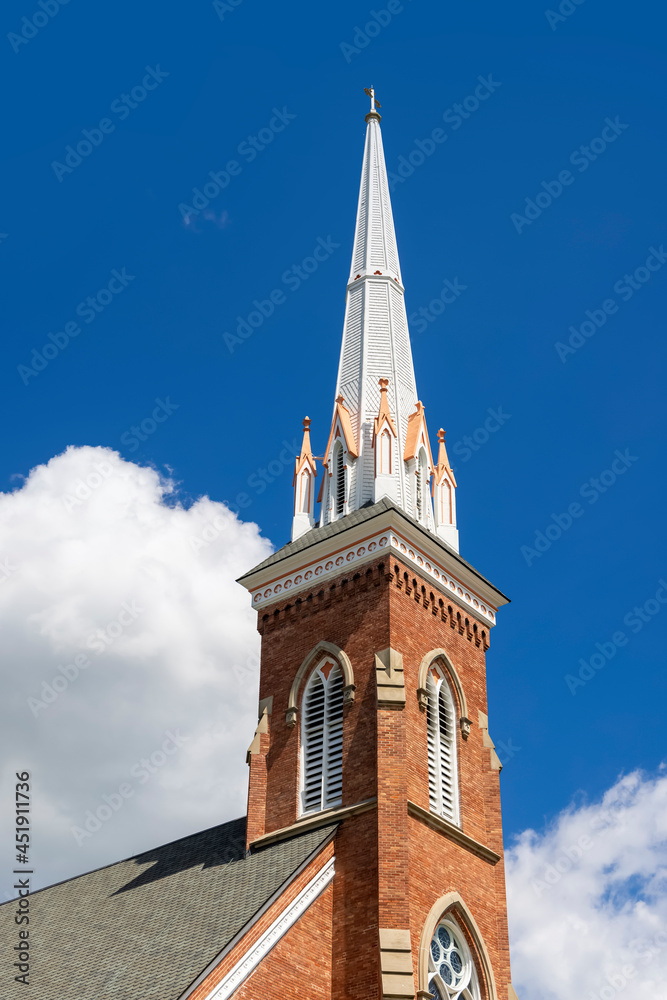 St Lorenz Lutheran Church steeple against blue sky located near Frankenmuth, Michigan. St Lorenz Lutheran Church steeple against blue sky located near Frankenmuth, Michigan.