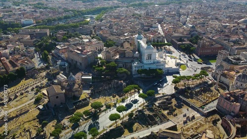 Aerial view around the Santa Maria in Ara coeli in sunny Rome, Italy - orbit, drone shot photo