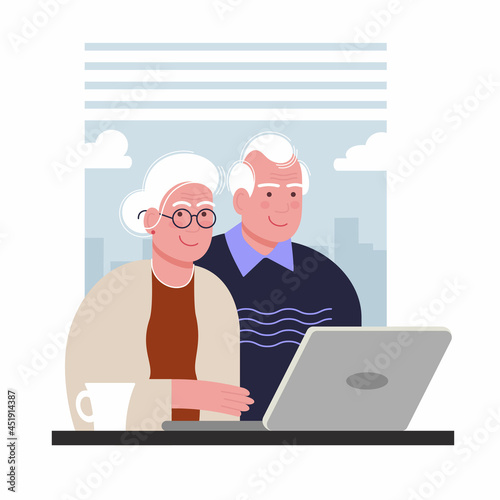 elderly couple at the computer