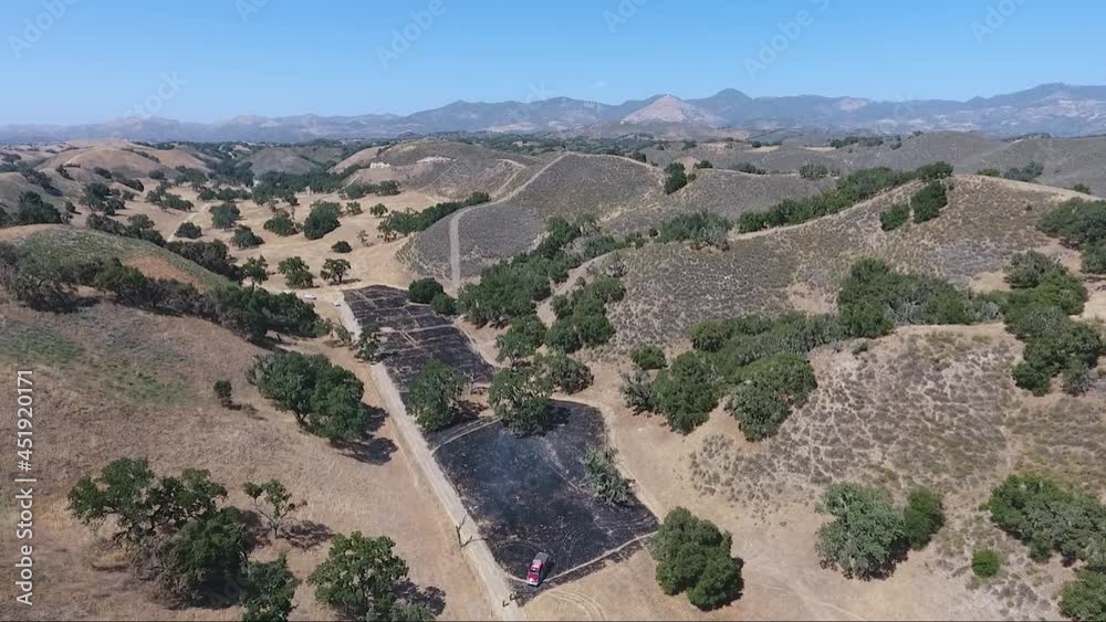Firefighter Trainee's burn grassland below ridge Firefighter Trainee's burn grassland below ridge