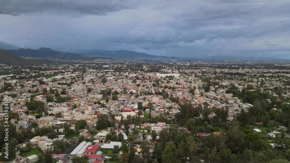 Jib down above houses and chinampas of Xochimilco, in a cloudy day in Mexico City. Jib down above houses and chinampas of Xochimilco, in a cloudy day in Mexico City.