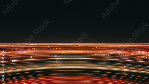 Night road lights. Lights of moving cars at night. long exposure multicolored. High quality photo