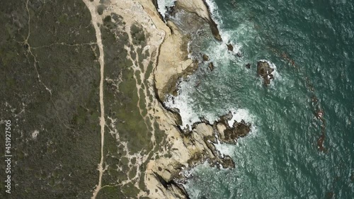 Birdseye view over the limestone cliff tops of Morrillos wildlife refuge in Cabos Puerto Rico on the Caribbean Sea. photo