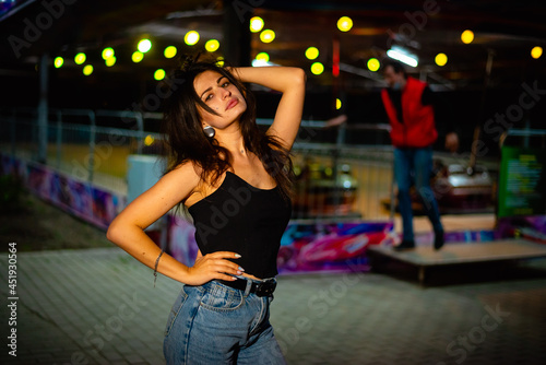 Night portrait of a charismatic girl