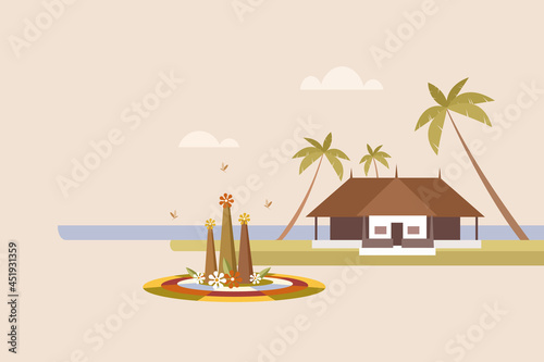Onam floral designs in front of a traditional Kerala house. Onam is a traditional festival in Kerala, India