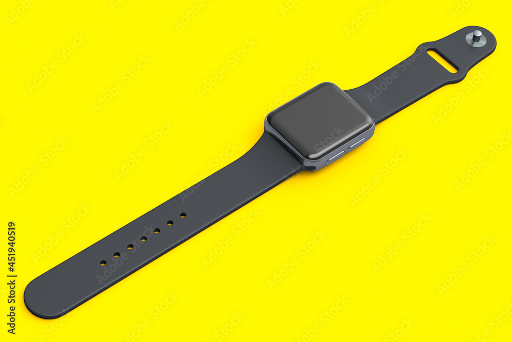 Stainless silver smart watch or fitness tracker isolated on yellow background.