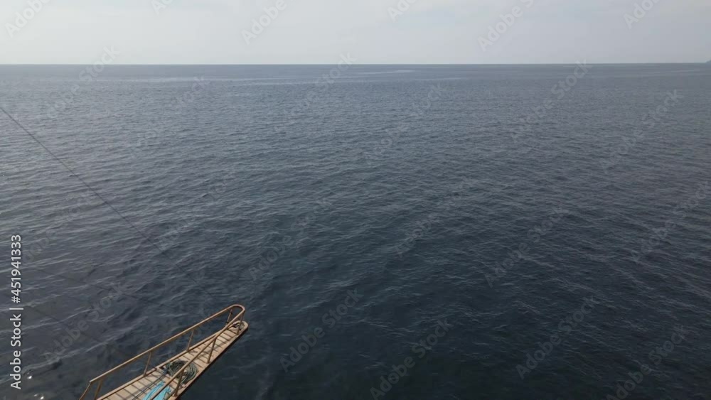 Traditional Wooden Boat Cruise Sailing In The Ocean With Calm Water.  - aerial