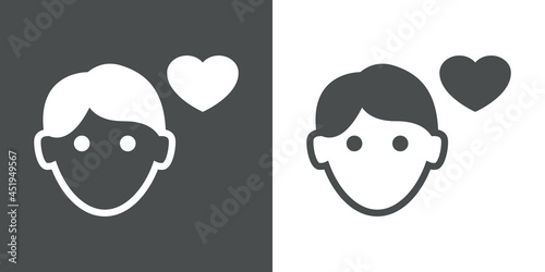 Hombre enamorado. Logotipo con silueta de cara de chico con corazón en fondo gris y fondo blanco
