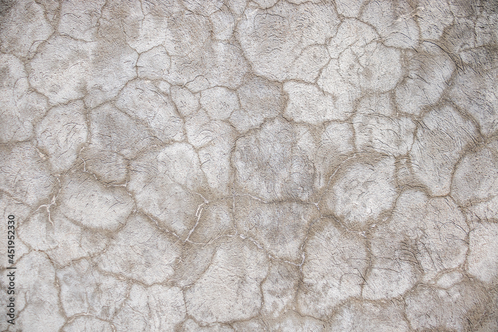 Cracked cement plastered wall as abstract background. Cracked cement plastered wall as abstract background.