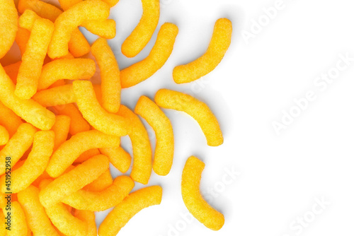 Cheese flavored puffed corn snacks isolated on white background.