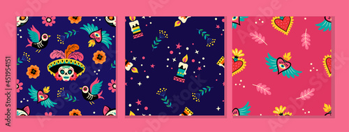 Mexican patterns collection. Seamless vector patterns with traditional Mexican sugar skulls, flowers, hearts and candles on dark blue and pink backgrounds