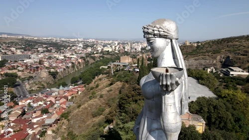 Aerial view of Kartlis Deda, Mother of Georgia statue in capital of Georgia, Tbilisi. Close up slow motion photo