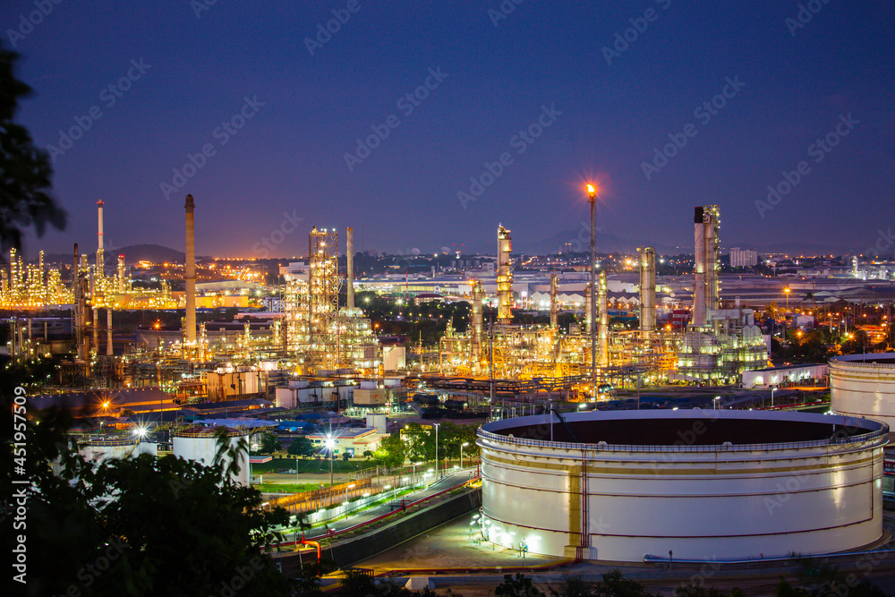 Tank crude oil scene of refinery plant and tower column of evening​ sunset Petrochemistry industry