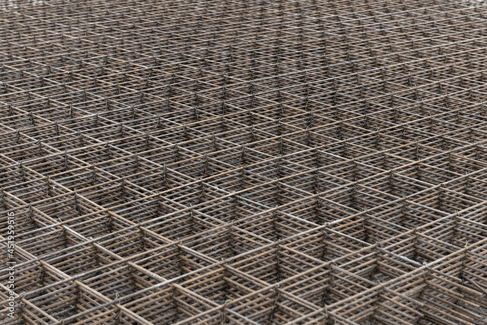 Steel bar iron wire in factory.Steel Rebars for reinforced concrete construction site.Steel reinforcement bar for industrial building Steel bar iron wire in factory.Steel Rebars for reinforced concrete construction site.Steel reinforcement bar for industrial building