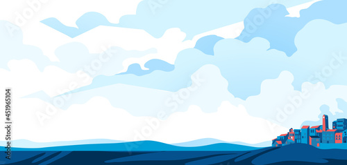Panorama con il cielo nuvoloso azzurro e città all'orizzonte