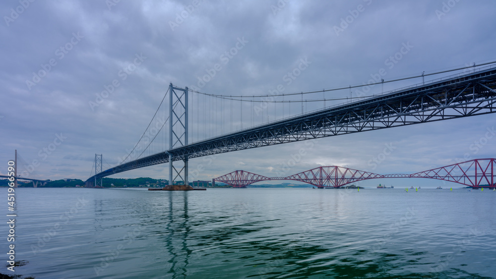 The Forth Crossings - the Forth Rail Bridge and the two road bridges - from South Queensferry, Scotland The Forth Crossings - the Forth Rail Bridge and the two road bridges - from South Queensferry, Scotland
