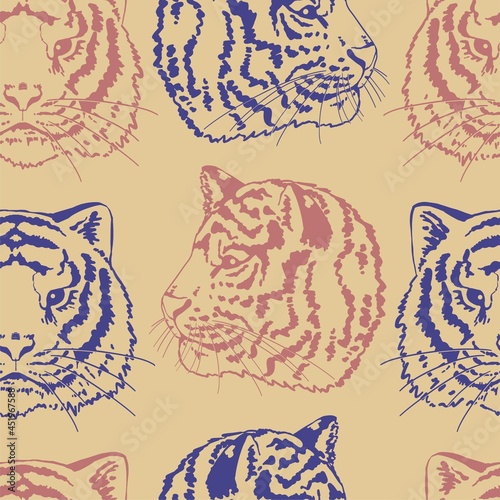 Tigers heads vector seamless pattern. Wild cats portraits colored retro ornament. Eastern calendar symbol of the year. Design for print, fabric, textile, background, wallpaper, wrap, card, decor etc. photo