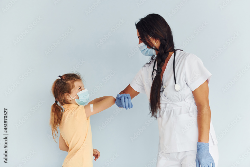 Procedure is done. Doctor in uniform making vaccination to the patient Procedure is done. Doctor in uniform making vaccination to the patient