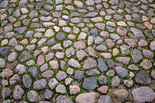 Hewn cobble stone pavement texture