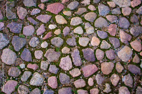 Hewn cobble stone pavement texture