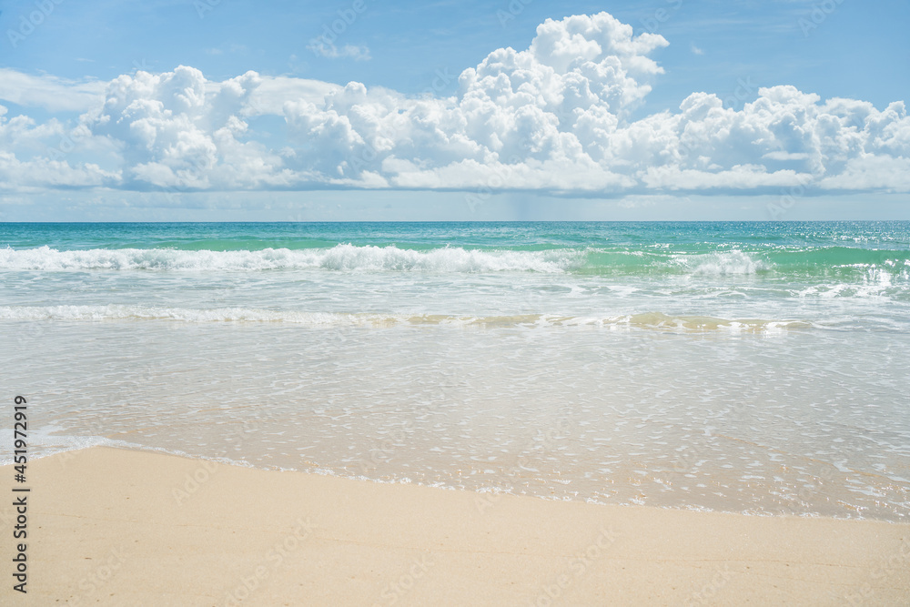 Beautiful waves breaking onto sand.Top view of clear turquoise sea and foamy waves. Beautiful waves breaking onto sand.Top view of clear turquoise sea and foamy waves.