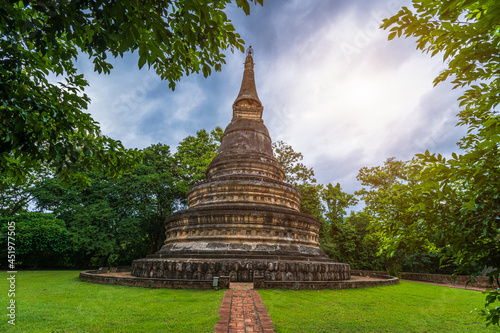 Ancient pagoda Wat Umong Suan Puthatham is a Buddhist temple in the historic centre and is a Buddhist temple is a major tourist attraction with green forest nature in Chiang Mai,Thailand. photo