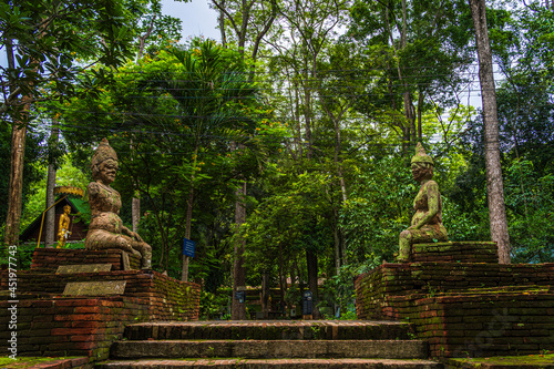 Wat Umong Suan Puthatham is a Buddhist temple in the historic centre and is a Buddhist temple is a major tourist attraction with green forest nature in Chiang Mai,Thailand. © Thinapob