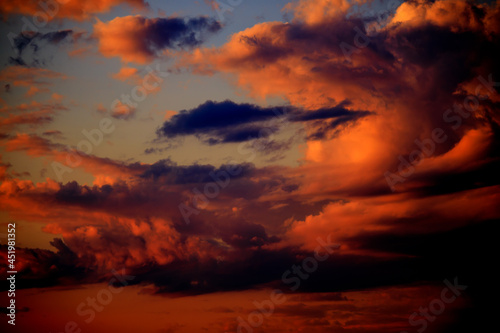 Clouds becoming a bright orange moody sky