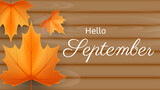 hello september background with autumn leaves