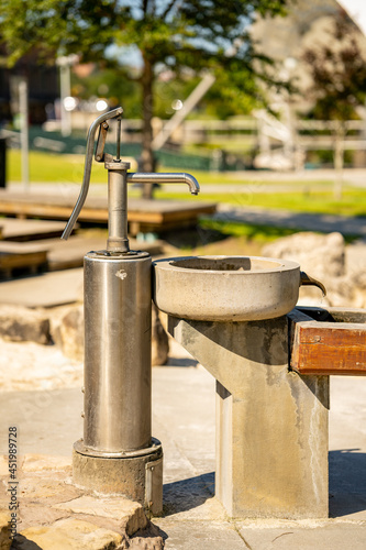 Hand pump well water fountain