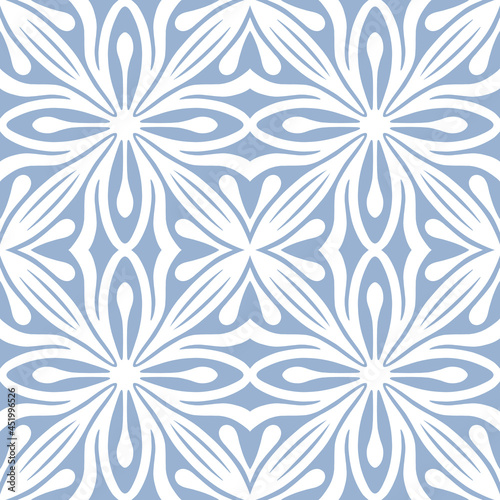 White arabesque ornament on a cerulean blue background. Delicate tile oriental design. Minimal wallpaper and fabric seamless texture. Home decor pattern in neutral colours