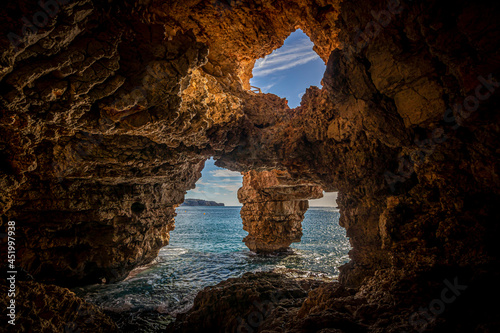 Natural cave on the coast in Spain, Benitatxell, Alicante, Cova dels Arcs