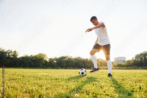 One person only. Young soccer player have training on the sportive field