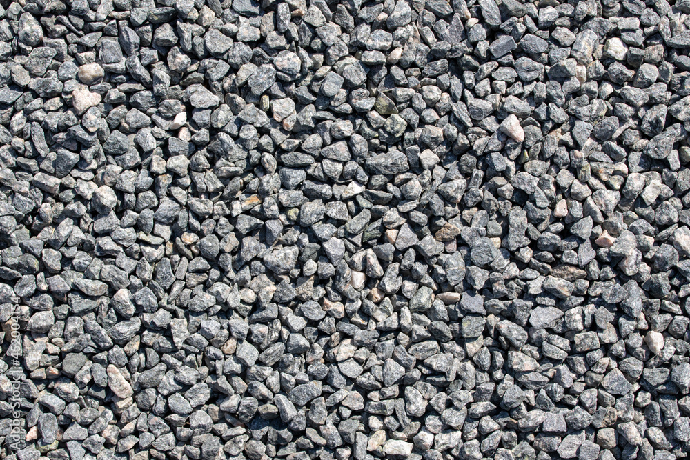 texture of gravel stones on ground background texture of gravel stones on ground background