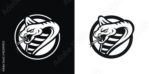 Black and white silhouette of a cobra snake in a circle.
